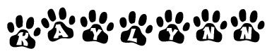 The image shows a series of animal paw prints arranged in a horizontal line. Each paw print contains a letter, and together they spell out the word Kaylynn.