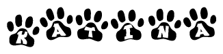 The image shows a series of animal paw prints arranged in a horizontal line. Each paw print contains a letter, and together they spell out the word Katina.