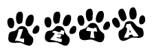 The image shows a row of animal paw prints, each containing a letter. The letters spell out the word Leta within the paw prints.
