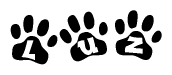 The image shows a series of animal paw prints arranged in a horizontal line. Each paw print contains a letter, and together they spell out the word Luz.