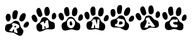 The image shows a series of animal paw prints arranged in a horizontal line. Each paw print contains a letter, and together they spell out the word Rhondac.