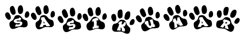 The image shows a series of animal paw prints arranged horizontally. Within each paw print, there's a letter; together they spell Sasikumar