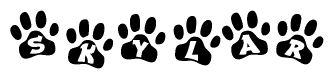 The image shows a series of animal paw prints arranged horizontally. Within each paw print, there's a letter; together they spell Skylar