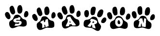 The image shows a series of animal paw prints arranged horizontally. Within each paw print, there's a letter; together they spell Sharon
