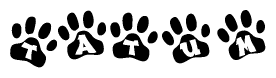 The image shows a series of animal paw prints arranged horizontally. Within each paw print, there's a letter; together they spell Tatum