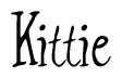 The image is of the word Kittie stylized in a cursive script.
