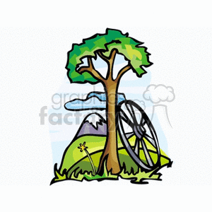 The clipart image features a tree with green leaves and a brown trunk, alongside a classic wooden wagon wheel resting against it. The background shows rolling green fields and a couple of mountains under a blue sky with a few white clouds.
