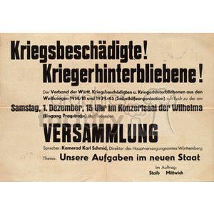 A historical German poster calling for a meeting of war victims and war survivors, organized by the Association of War Victims and War Survivors of Wrttemberg. The meeting is scheduled for Saturday, December 1st at 3 PM in the concert hall of the Wilhelma. The theme of the meeting is 'Our Tasks in the New State' and a speaker named Kamerad Karl Schmid is mentioned.