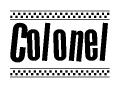 The image is a black and white clipart of the text Colonel in a bold, italicized font. The text is bordered by a dotted line on the top and bottom, and there are checkered flags positioned at both ends of the text, usually associated with racing or finishing lines.