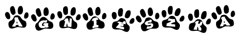 The image shows a series of animal paw prints arranged in a horizontal line. Each paw print contains a letter, and together they spell out the word Agnieszka.