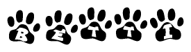 The image shows a series of animal paw prints arranged horizontally. Within each paw print, there's a letter; together they spell Betti