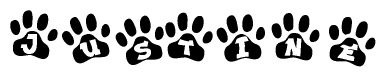 The image shows a row of animal paw prints, each containing a letter. The letters spell out the word Justine within the paw prints.