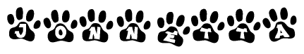 The image shows a series of animal paw prints arranged in a horizontal line. Each paw print contains a letter, and together they spell out the word Jonnetta.