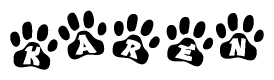 The image shows a row of animal paw prints, each containing a letter. The letters spell out the word Karen within the paw prints.