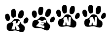 The image shows a row of animal paw prints, each containing a letter. The letters spell out the word Kenn within the paw prints.