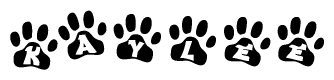 The image shows a series of animal paw prints arranged horizontally. Within each paw print, there's a letter; together they spell Kaylee