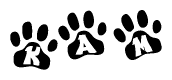 The image shows a row of animal paw prints, each containing a letter. The letters spell out the word Kam within the paw prints.