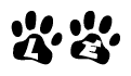The image shows a series of animal paw prints arranged in a horizontal line. Each paw print contains a letter, and together they spell out the word Le.