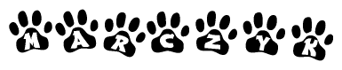 The image shows a series of animal paw prints arranged horizontally. Within each paw print, there's a letter; together they spell Marczyk
