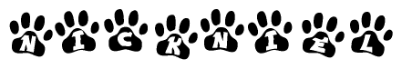 The image shows a series of animal paw prints arranged in a horizontal line. Each paw print contains a letter, and together they spell out the word Nickniel.