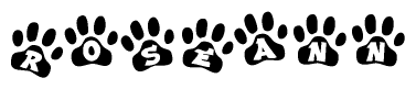 The image shows a series of animal paw prints arranged horizontally. Within each paw print, there's a letter; together they spell Roseann