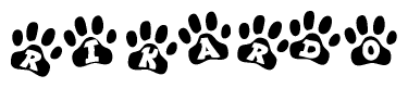 The image shows a row of animal paw prints, each containing a letter. The letters spell out the word Rikardo within the paw prints.