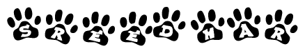 The image shows a row of animal paw prints, each containing a letter. The letters spell out the word Sreedhar within the paw prints.