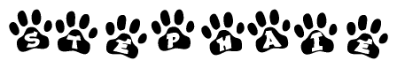 The image shows a series of animal paw prints arranged horizontally. Within each paw print, there's a letter; together they spell Stephaie