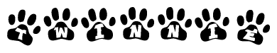 The image shows a series of animal paw prints arranged in a horizontal line. Each paw print contains a letter, and together they spell out the word Twinnie.