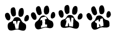 The image shows a series of animal paw prints arranged horizontally. Within each paw print, there's a letter; together they spell Vinh