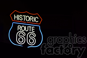 A neon sign displaying 'Historic Route 66' on a black background.