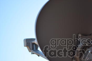 Close-up image of a satellite dish with a clear blue sky in the background.