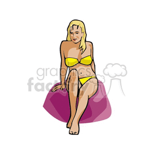 Woman Sunbathing on Beach in Yellow Bikini