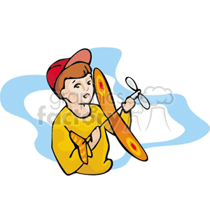 Little boy in a baseball cap holding a toy airplane