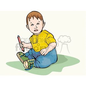 A little boy with a pencil in his hand