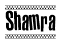 The image is a black and white clipart of the text Shamra in a bold, italicized font. The text is bordered by a dotted line on the top and bottom, and there are checkered flags positioned at both ends of the text, usually associated with racing or finishing lines.