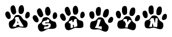 The image shows a row of animal paw prints, each containing a letter. The letters spell out the word Ashlyn within the paw prints.