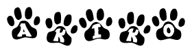 The image shows a row of animal paw prints, each containing a letter. The letters spell out the word Akiko within the paw prints.