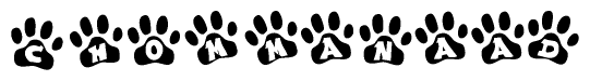 The image shows a series of animal paw prints arranged in a horizontal line. Each paw print contains a letter, and together they spell out the word Chommanaad.