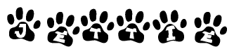 The image shows a row of animal paw prints, each containing a letter. The letters spell out the word Jettie within the paw prints.