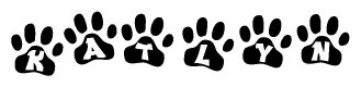 The image shows a row of animal paw prints, each containing a letter. The letters spell out the word Katlyn within the paw prints.