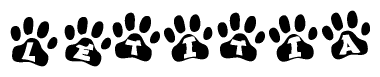 The image shows a series of animal paw prints arranged horizontally. Within each paw print, there's a letter; together they spell Letitia