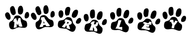 The image shows a series of animal paw prints arranged in a horizontal line. Each paw print contains a letter, and together they spell out the word Markley.