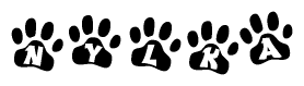 The image shows a series of animal paw prints arranged in a horizontal line. Each paw print contains a letter, and together they spell out the word Nylka.