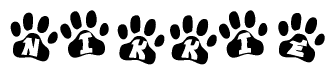 The image shows a series of animal paw prints arranged in a horizontal line. Each paw print contains a letter, and together they spell out the word Nikkie.