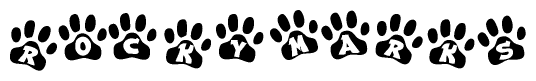 The image shows a series of animal paw prints arranged in a horizontal line. Each paw print contains a letter, and together they spell out the word Rockymarks.