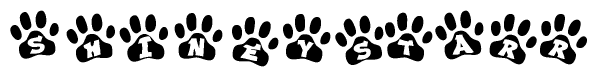 The image shows a row of animal paw prints, each containing a letter. The letters spell out the word Shineystarr within the paw prints.