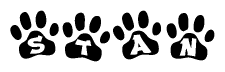 The image shows a series of animal paw prints arranged in a horizontal line. Each paw print contains a letter, and together they spell out the word Stan.