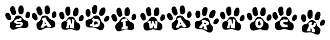 The image shows a row of animal paw prints, each containing a letter. The letters spell out the word Sandiwarnock within the paw prints.