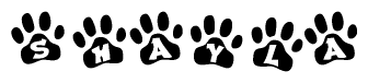The image shows a series of animal paw prints arranged horizontally. Within each paw print, there's a letter; together they spell Shayla